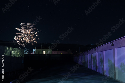 Beautiful colorful holiday fireworks in the night sky. long exposure. Holiday Concept
