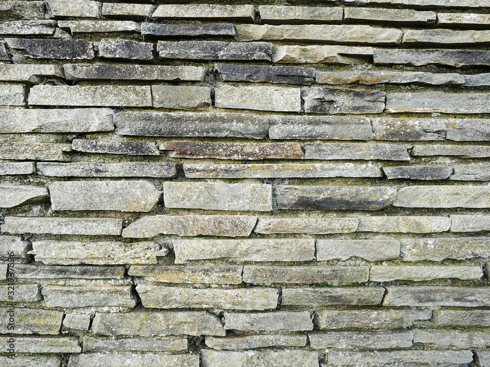Simple stone wall texture. Graphic design background. Simple stone wall texture. Graphic design background.