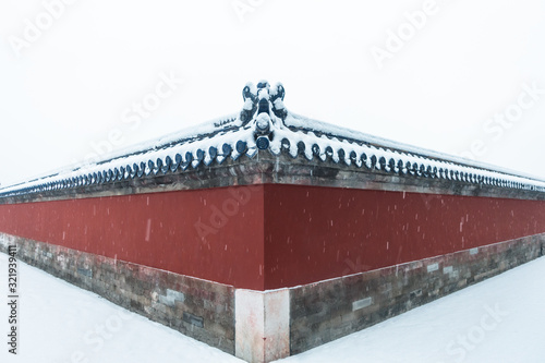 The red wall in Temple of Heaven in snow