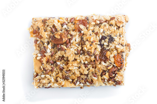 Homemade granola from oat flakes, dates, dried apricots, raisins, nuts isolated on white background. top view.
