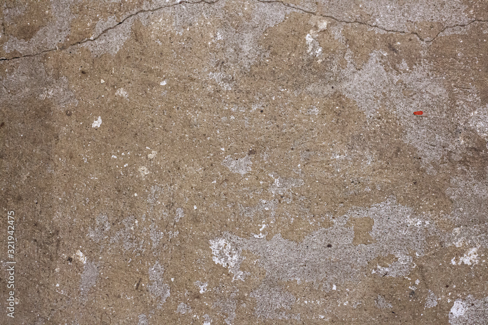 Concrete wall texture. Wall after removing paint. Bare cement. Rough surface. Gray faceless