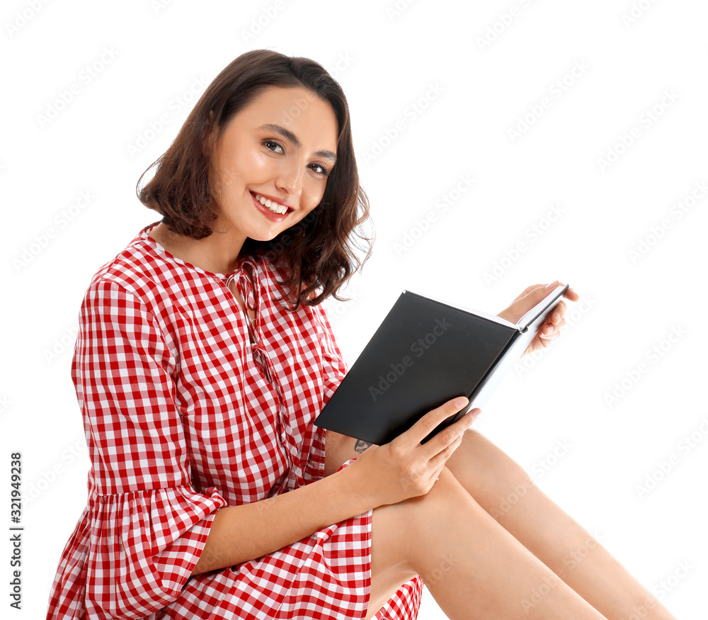 Beautiful young woman reading book on white background Beautiful young woman reading book on white background