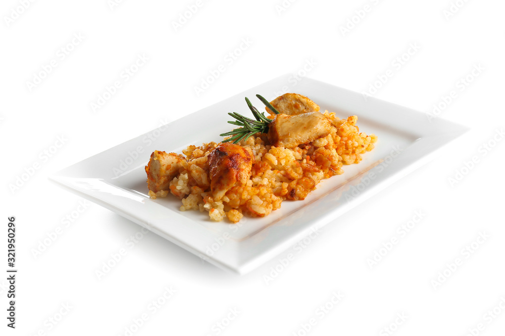 Plate with tasty rice and chicken on white background Plate with tasty rice and chicken on white background
