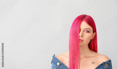 Beautiful young woman with ...