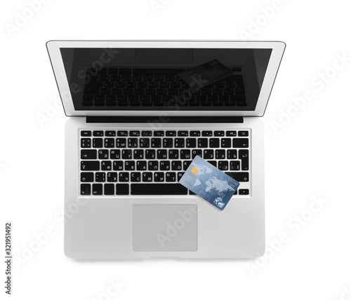 Credit card with laptop on ...