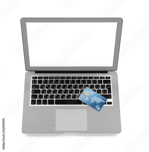 Credit card with laptop on ...