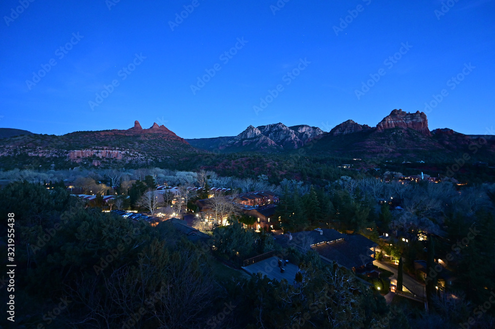 Sedona, Arizona - January 25, 2020 - East Sedona with red rock formations in background in late evening.