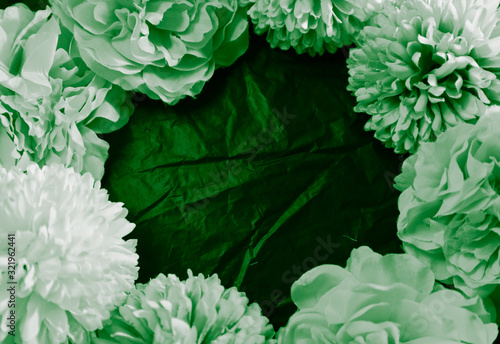 Beautiful abstract color white and green flowers on black background and black flower frame and green leaves texture, green background, colorful graphics banner happy valentine