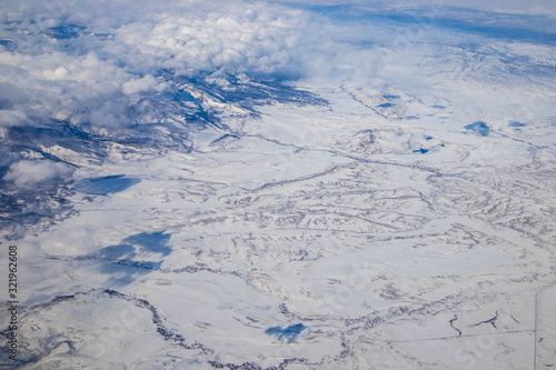 The snow land. View from the airplane 