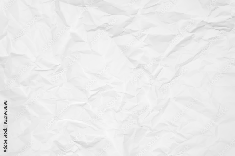 Fototapeta premium White crumpled paper texture background. Clean white paper. Top view. 