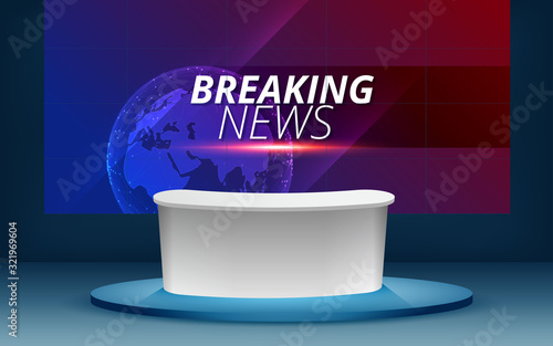 breaking news on the lcd tv in the news studio	