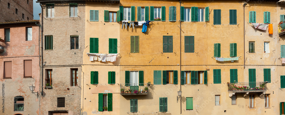Exterior of residential building in Siena, Tuscany, Italy