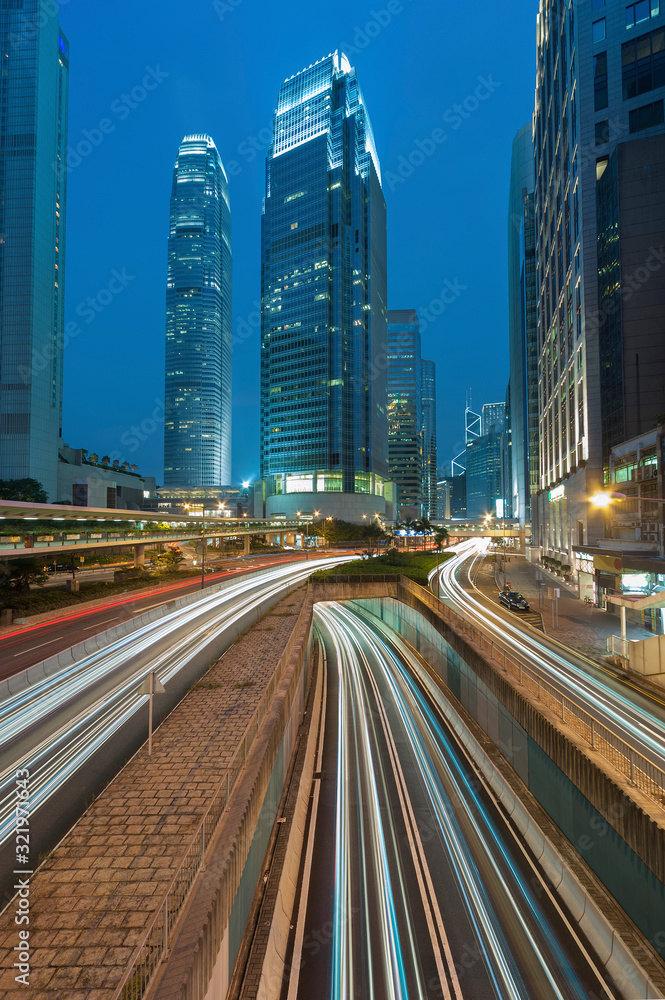 Fototapeta premium Hong Kong city at dusk with busy traffic