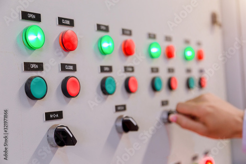 Engineer is check Electrical control panel in factory / Control panel System ready. photo