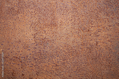 Rusty texture. Rough surface of oxidized metal. Rust hit the metal. Old metal tin sheet. Background to create the effect of red and rotten steel frame.