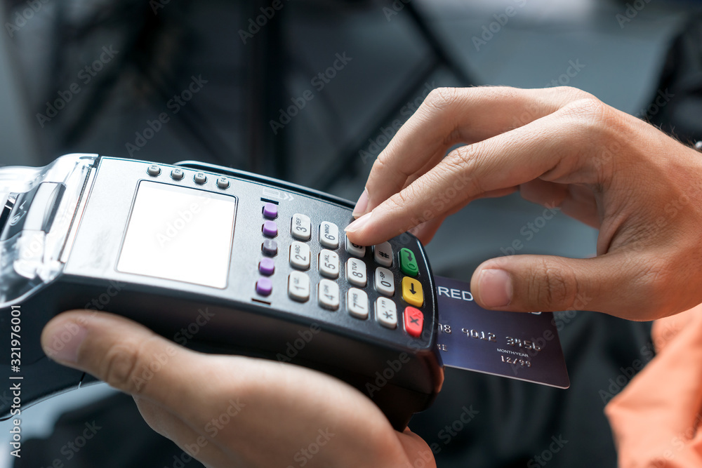 Mockup Credit card payment for purchase sell products service, business people hand pushing button or swipe to buy shopping through electronic transaction machine, Payments by credit card in terminal Mockup Credit card payment for purchase sell products service, business people hand pushing button or swipe to buy shopping through electronic transaction machine, Payments by credit card in terminal