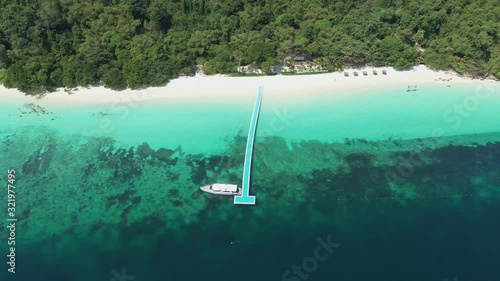 Footage B-roll of Aerial view ocean waves, beach and rocky coastline and beautiful forest. Nyaung Oo Phee Island Myanmar Tropical seas and islands in southern Myanmar. Beautiful tourist attractions.