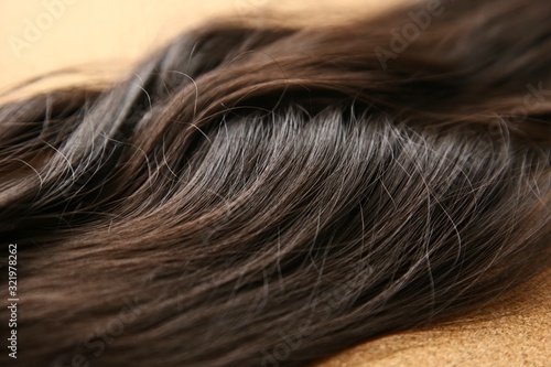 Brunette hair extensions (weave). Close up shot. 