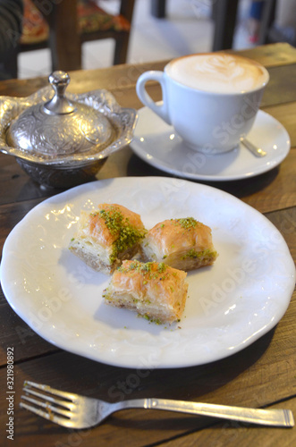 Turkish pistachio pastry dessert baklava with green pistachios.