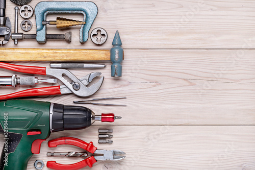 A set of tools for doing household chores. Background of household tools. Close-up, studio shot, copy space. photo