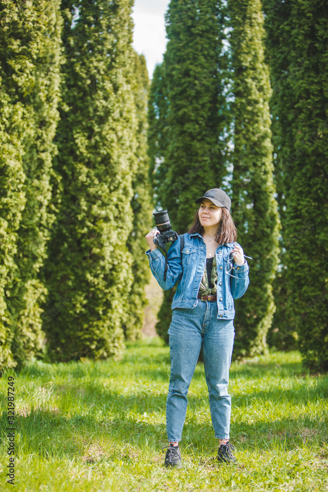 pretty woman photographer holding professional camera pretty woman photographer holding professional camera