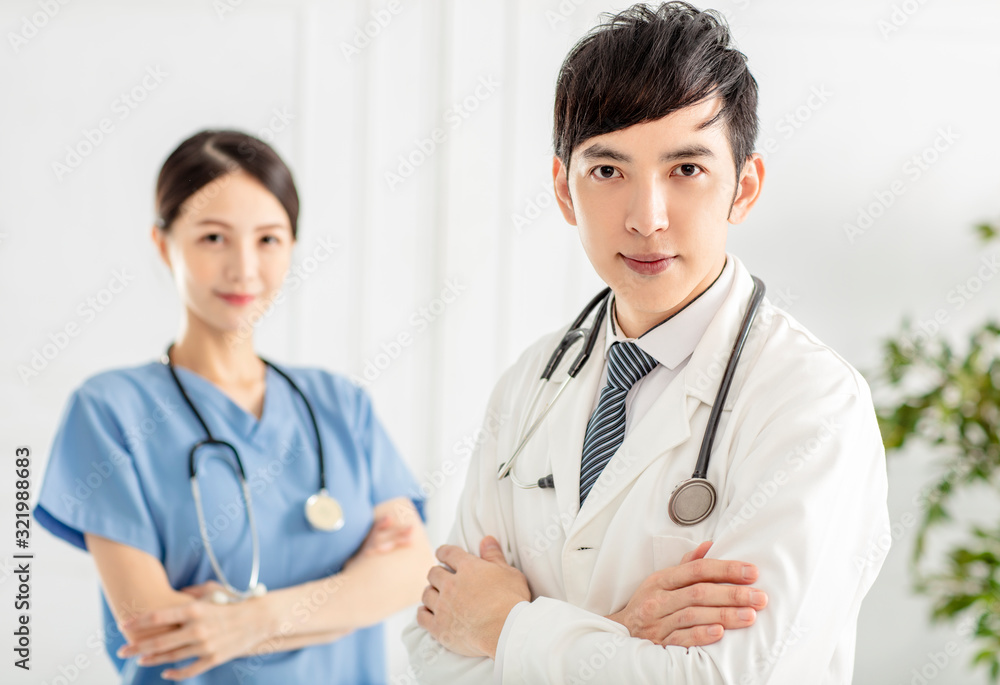 Two smart and professional smiling doctors Two smart and professional smiling doctors
