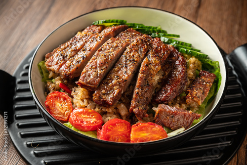 plum bbq sauce pork chop with broccoli and steamed brown rice