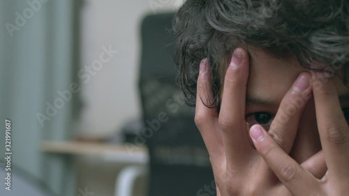 Young asian boy stay alone and sadness