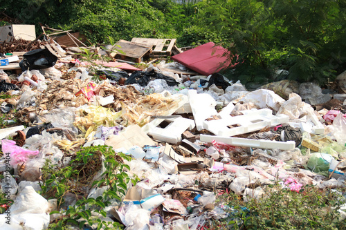 Mountain garbage in the forest. Garbage in the forest - dump in the woods