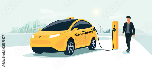 Yellow electric car taxi charging on charger station with taxi driver and city skyline. Shared battery EV vehicle plugged getting electricity from renewable power generations solar panel wind turbine.