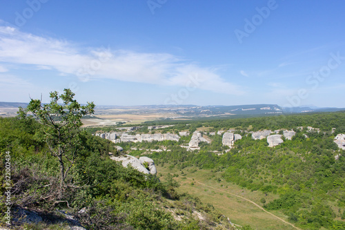 Rocky formations. Rocky terrain. Limestone skaa. Ancient gorge in the mountains. Natural landscape in a southern country. A tourist place to stay. photo