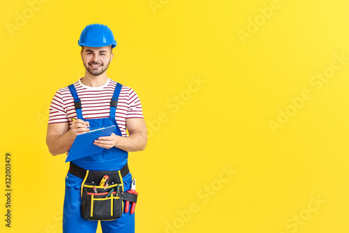 Handsome male worker with c...
