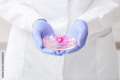 Scientist with flower sampl...