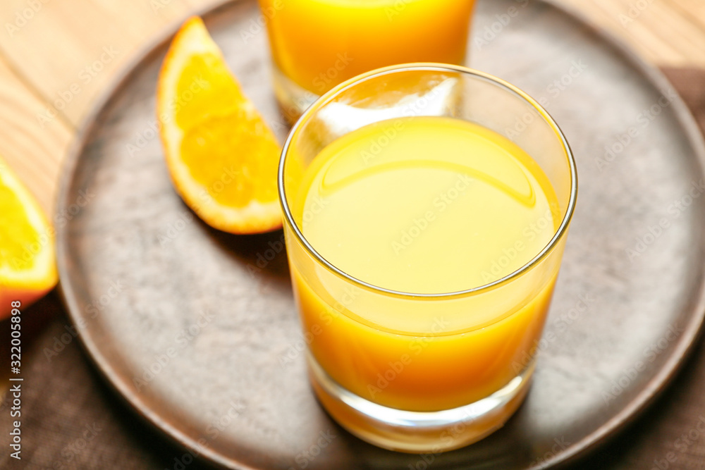Glasses of fresh orange juice on table Glasses of fresh orange juice on table