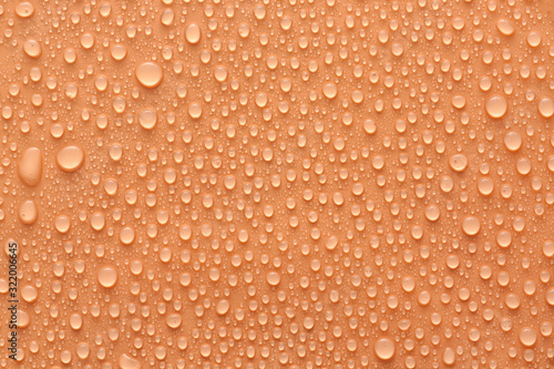 Water drops on color background