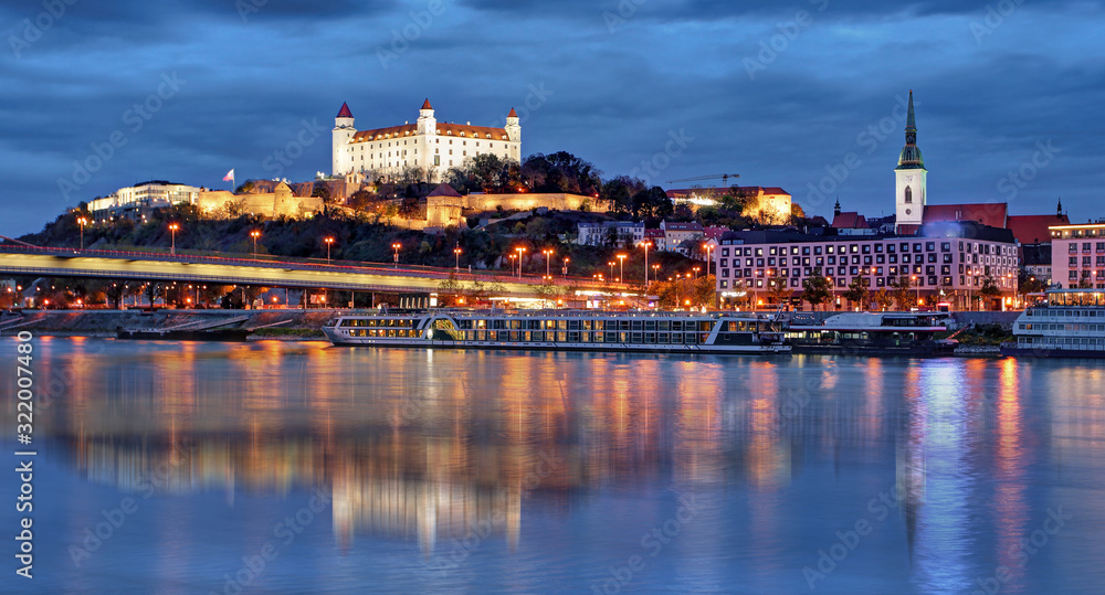 Bratislava skyline at night with castle, Slovakia