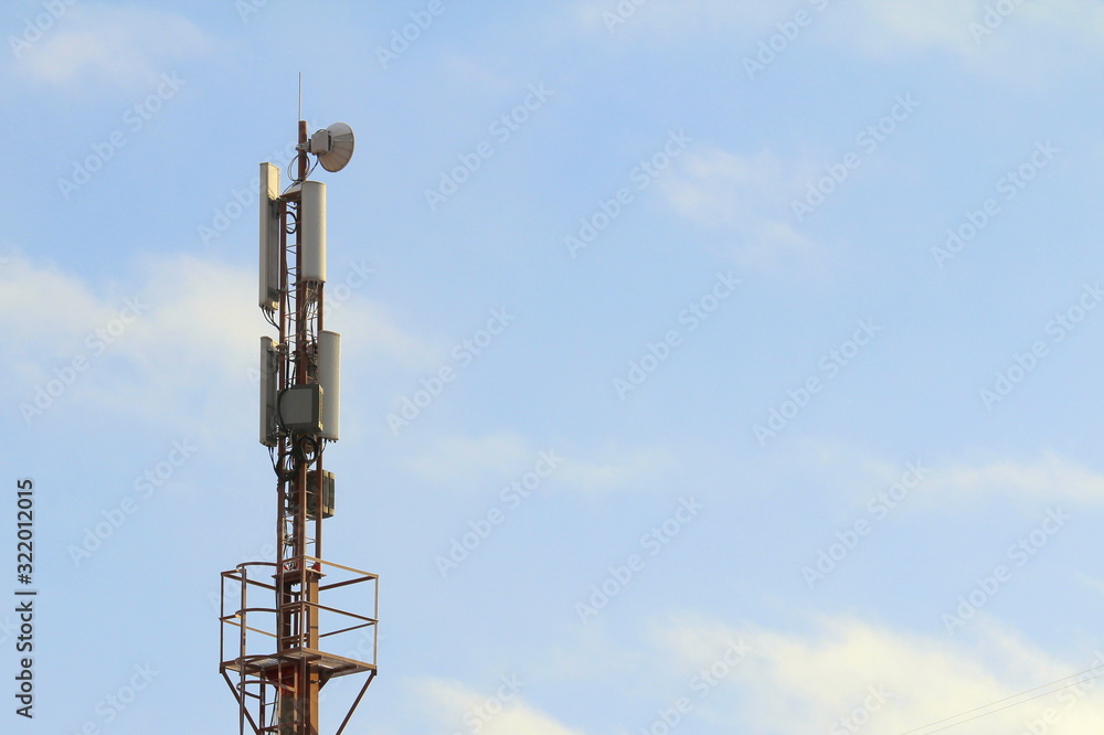 Base station mobile network antenna on a steel structure mast with a repeater. Base station mobile network antenna on a steel structure mast with a repeater.