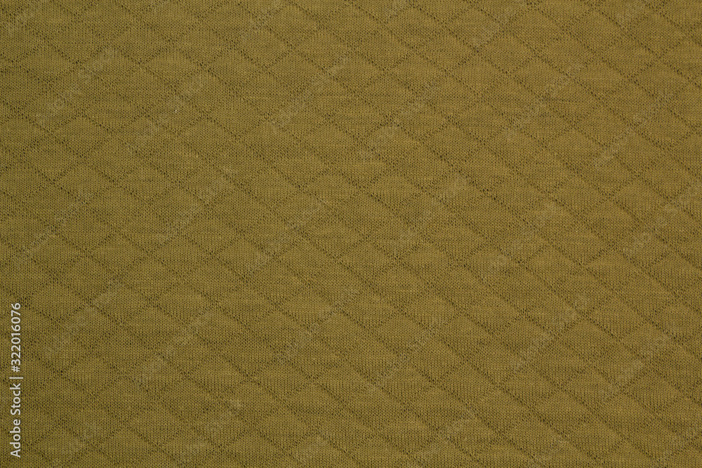 Fototapeta premium Fabric cotton fold, top view. Green textile