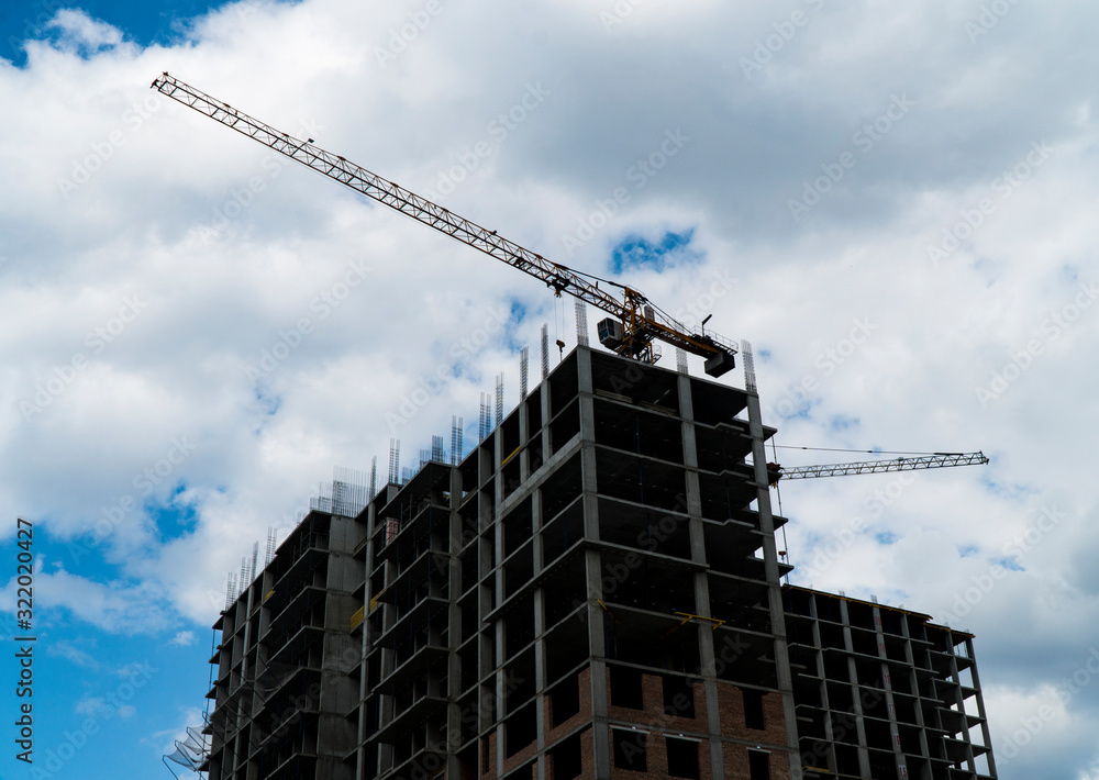 Photo of a multi-storey building under construction Photo of a multi-storey building under construction