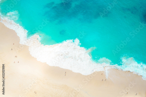 Top view of beach and sand on the seashore with shoreline as vacation and travel concept