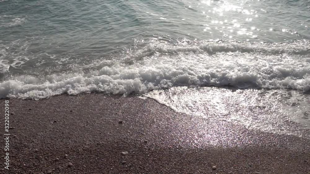 Waves of the sea reaching the shore of the beach Waves of the sea reaching the shore of the beach