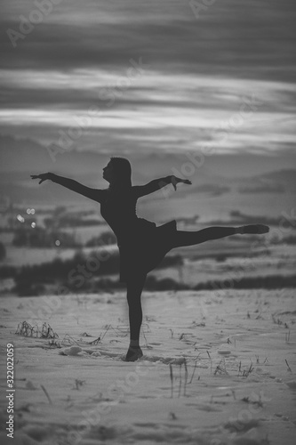 silhouette of girl in the snow