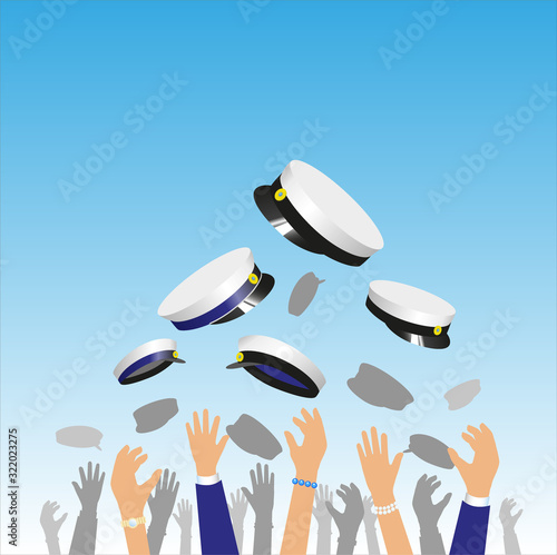 Hands in the air, happy graduation students throwing their caps. Celebrating "Studenten", the finish from Gymnasium. Traditional Swedish graduation caps. Blue and black ribbons. 