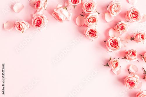 Flowers composition. Rose flowers on pink background. Valentines day, mothers day, womens day concept. Flat lay, top view, copy space
