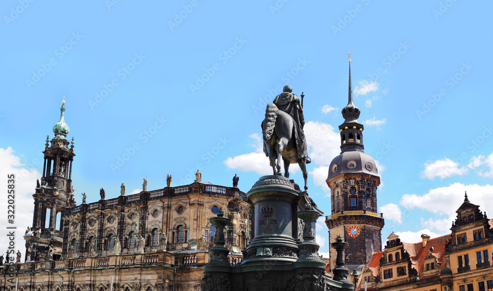Theaterplatz, King Johann statue, Hofkirche, Residenzschloss, Hausmannsturm, Dresden, Germany. Blue sky, panoramic view