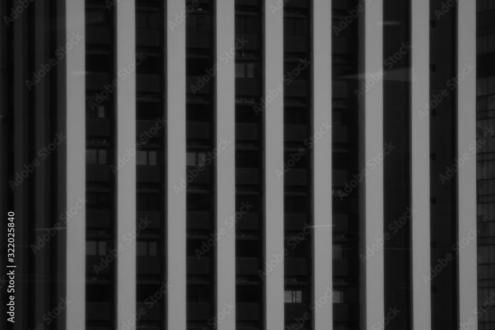 urban image in black and white with light and dark abstract lines of cement structures