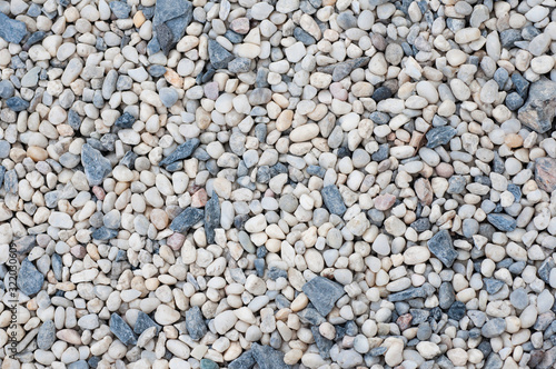 Small rock surface for background and texture, various size of rock on ground.