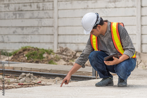 Man construction engineer at construction site