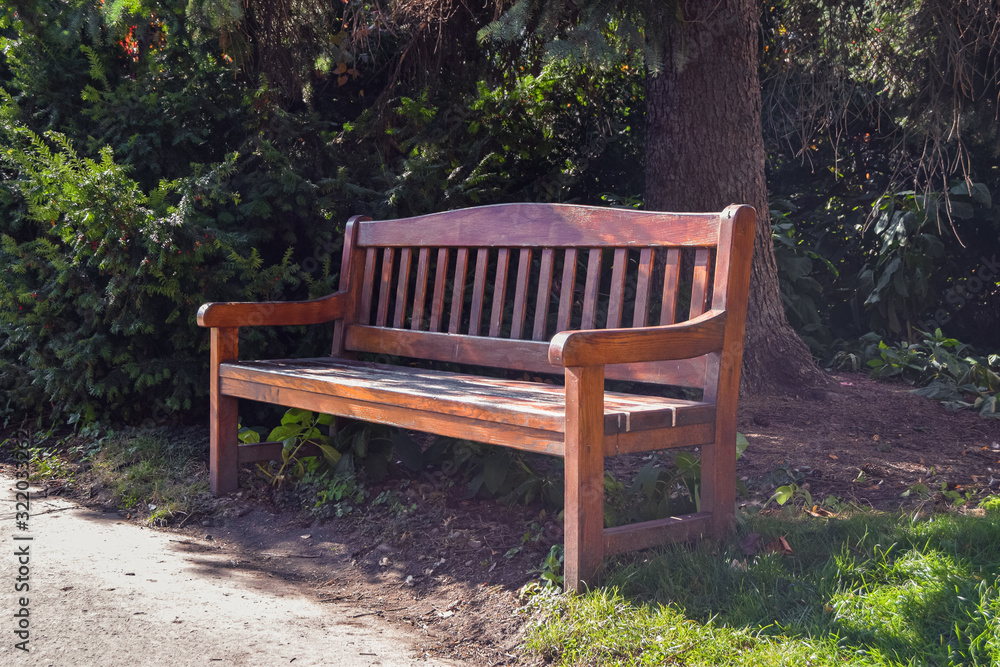 Wooden bench in park, Prague, Czech Republic Wooden bench in park, Prague, Czech Republic