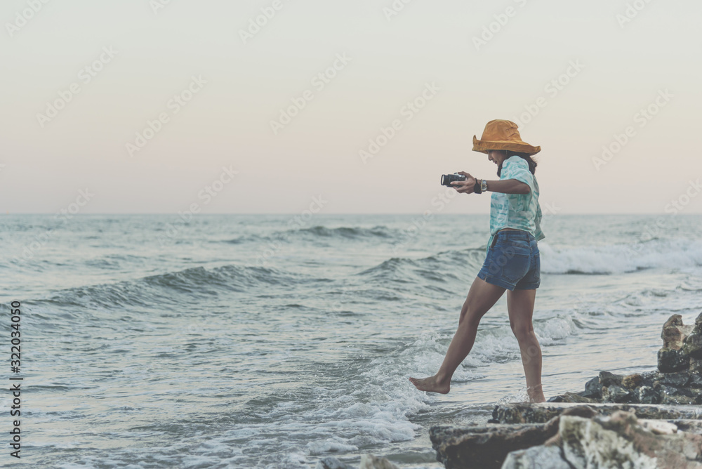 Woman relax at sea beach in concept travel